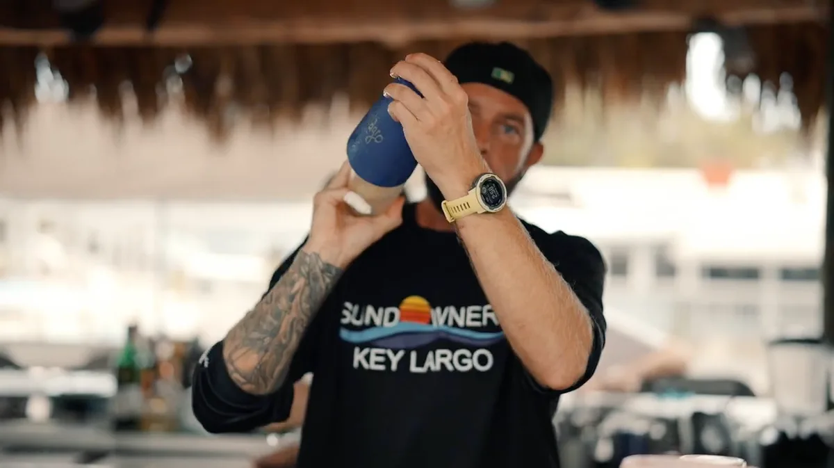 Sundowners team member preparing a drink behind the bar in Key Largo