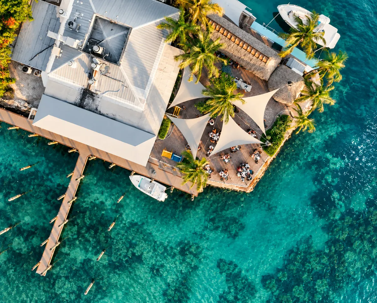 Aerial view of Sundowners, its waterfront patio and dock in Key Largo